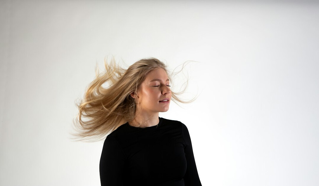 Portrait of a smiling woman with long hair
