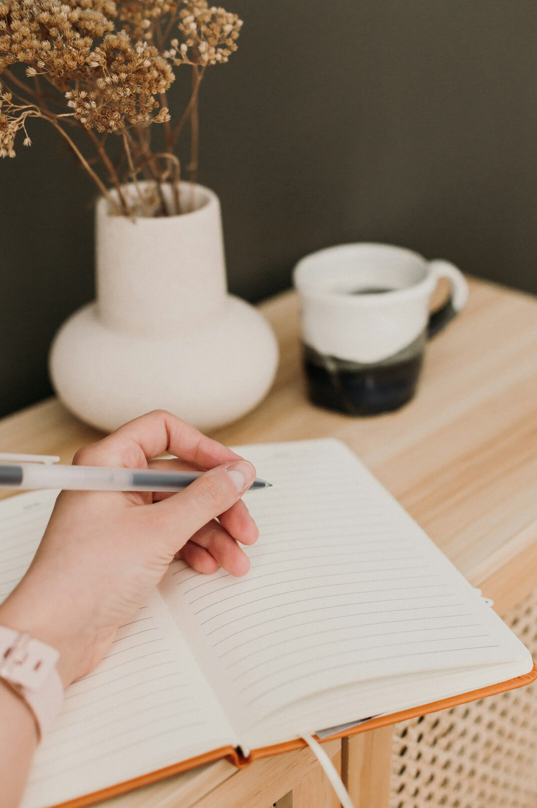 person writing notes